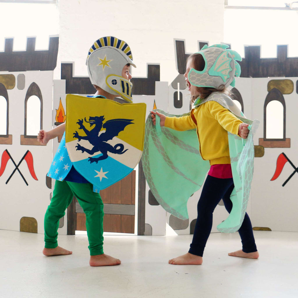 children playing costumes knight dragon lovelane designs