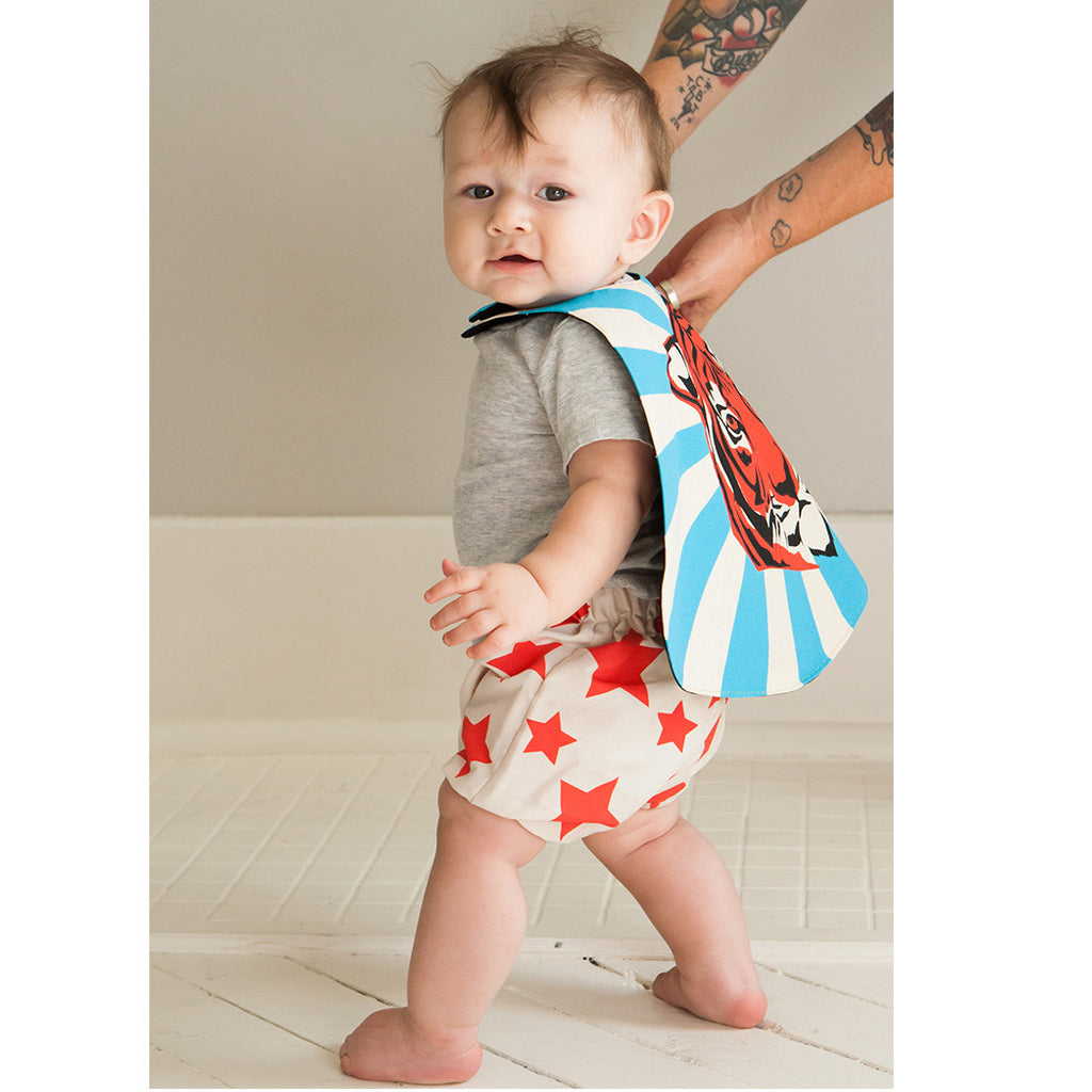 Child Superhero in action tiger cape lovelane designs